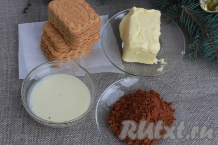 Ингредиенты для приготовления шоколадной колбаски из печенья, какао и сгущенки.