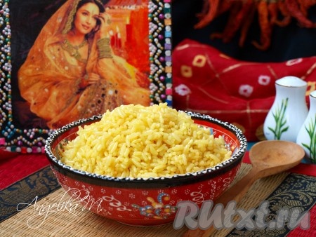 Ароматный, рассыпчатый, вкусный рис по-индийски готов. Раскладывать рис в тарелки нужно деревянной ложкой, чтобы сохранить его внешний вид.
