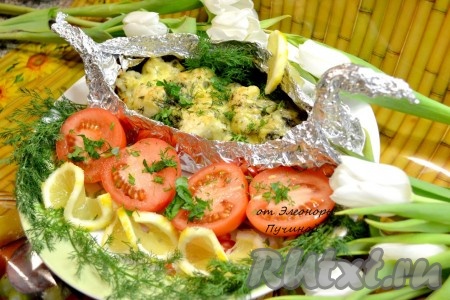 Рыба, запеченная с овощами в духовке, готова. 

