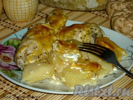 Картошка с куриными ножками, приготовленная в духовке, получается очень вкусной.